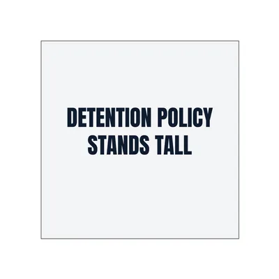 DETENTION POLICY · STANDS TALL in White