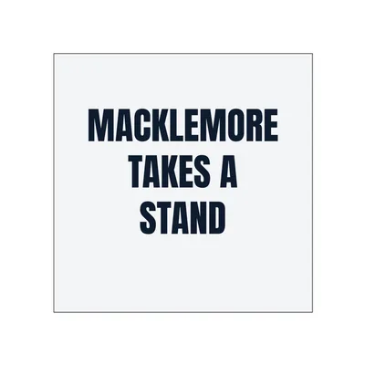 MACKLEMORE · TAKES A · STAND in White
