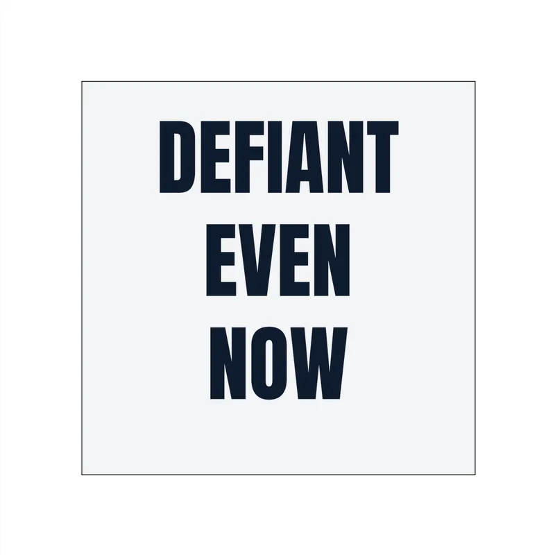 DEFIANT · EVEN · NOW in White
