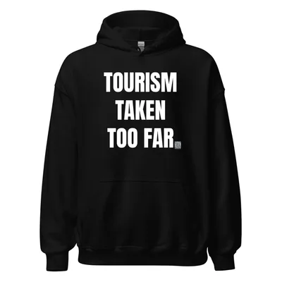 TOURISM · TAKEN · TOO FAR in Black