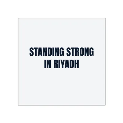 STANDING STRONG · IN RIYADH in White