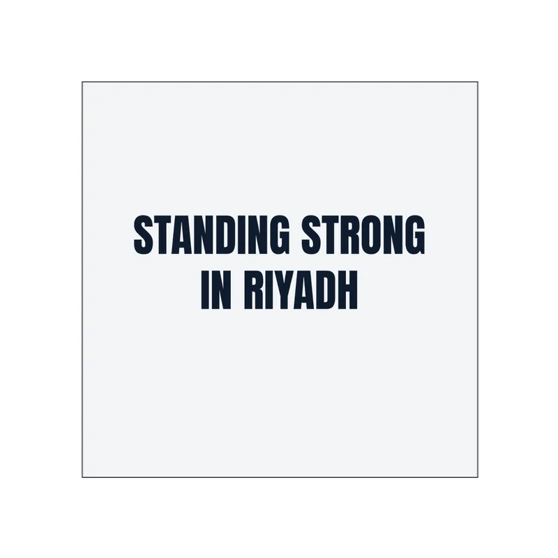 STANDING STRONG · IN RIYADH in White