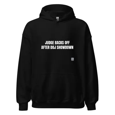 JUDGE BACKS OFF · AFTER DOJ SHOWDOWN in Black